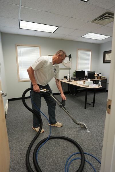 Professional carpet cleaning in a clean office space